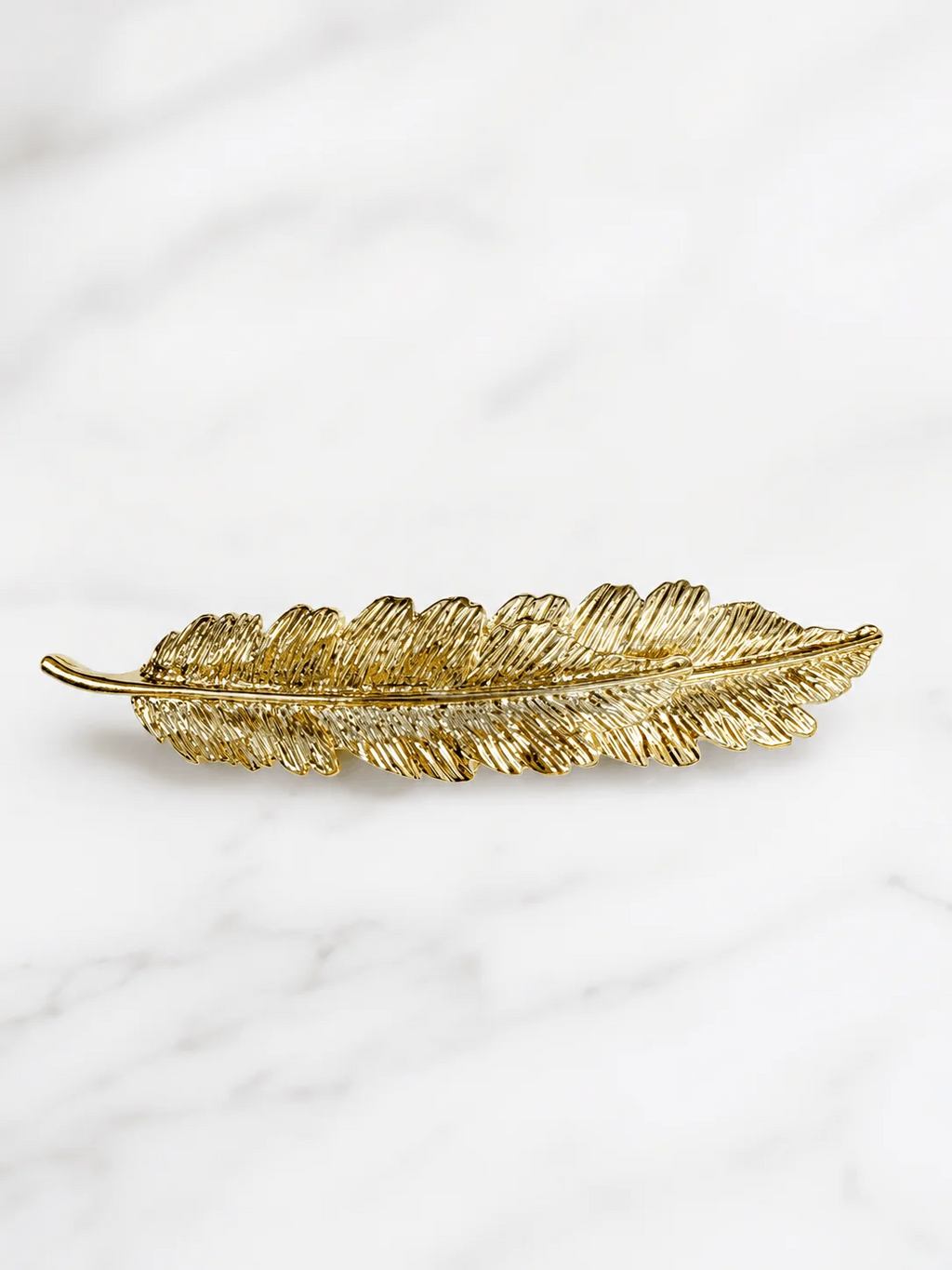 Barrette à cheveux - plume dorée