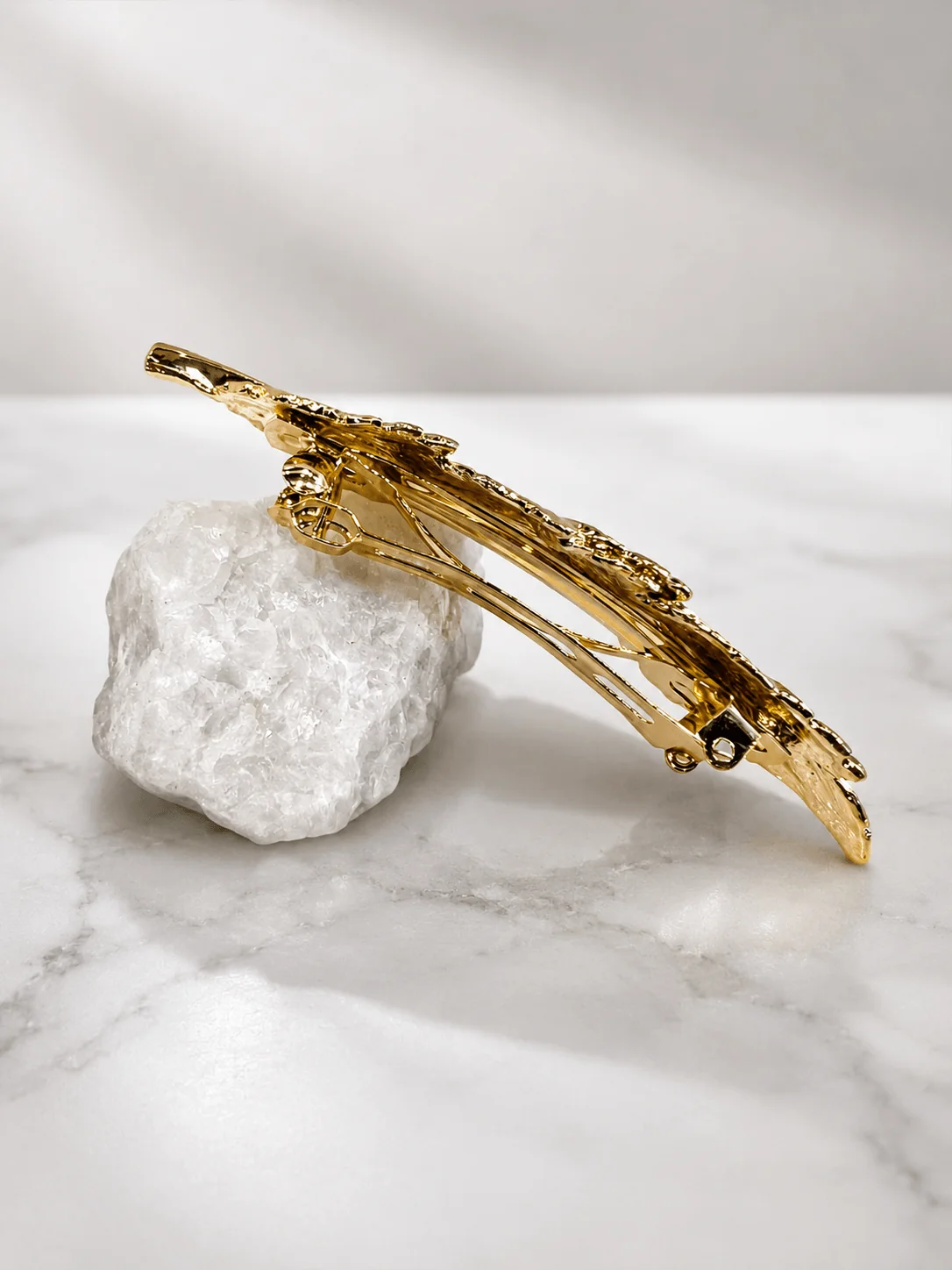 Barrette à cheveux - plume dorée